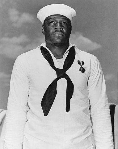 Doris "Dorie" Miller wears the Navy Cross, awarded for bravery during the Pearl Harbor attack. (Public Domain Photo)