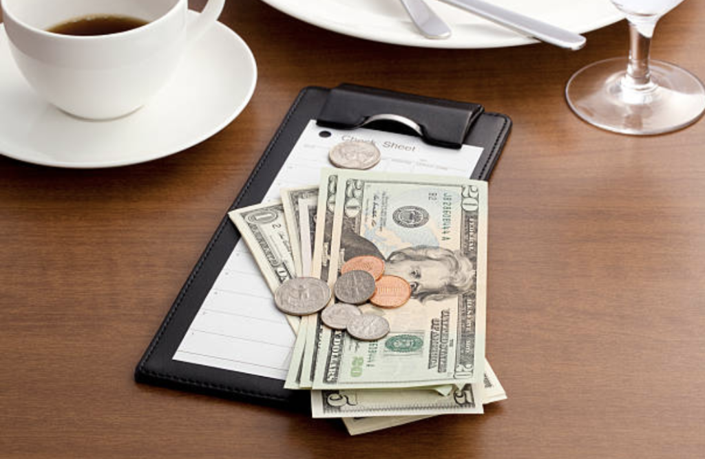 Initiative 77 Was Approved–Then Repealed. I’m Confused: Do I Still Need to Tip My Server?